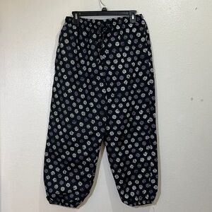 Natural Chic black padded pants with elastic bottoms. Size Large.